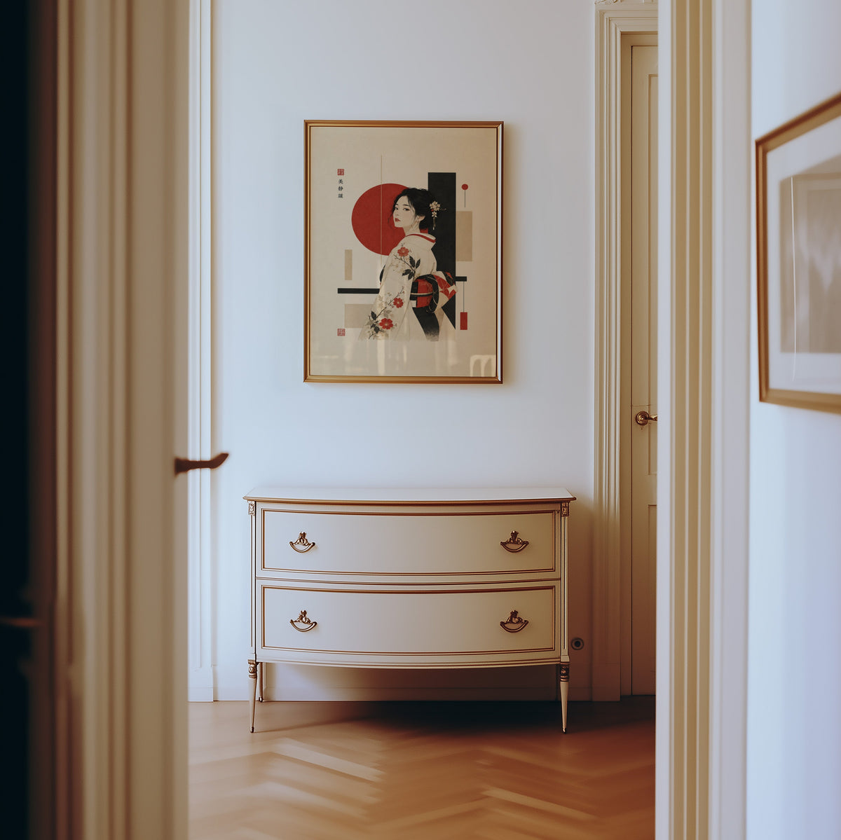 kimono woman with red circle print shown in a gold frame in a hallway above a cream dresser