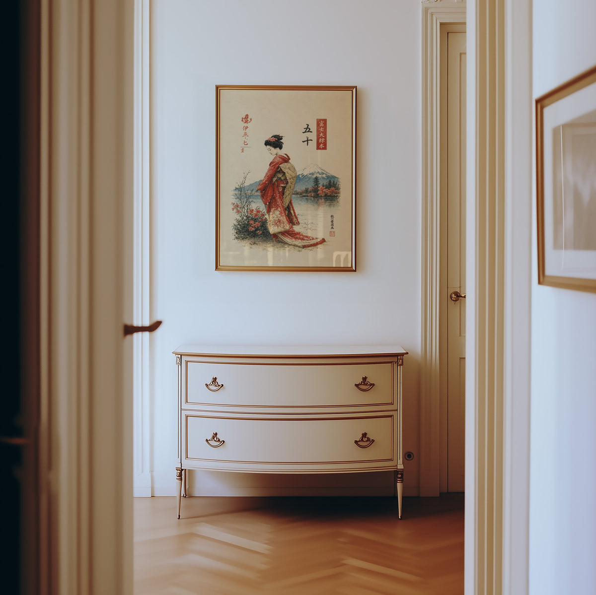 woman in red kimono by Mount Fuji print shown in a gold frame in a hallway above a cream dresser