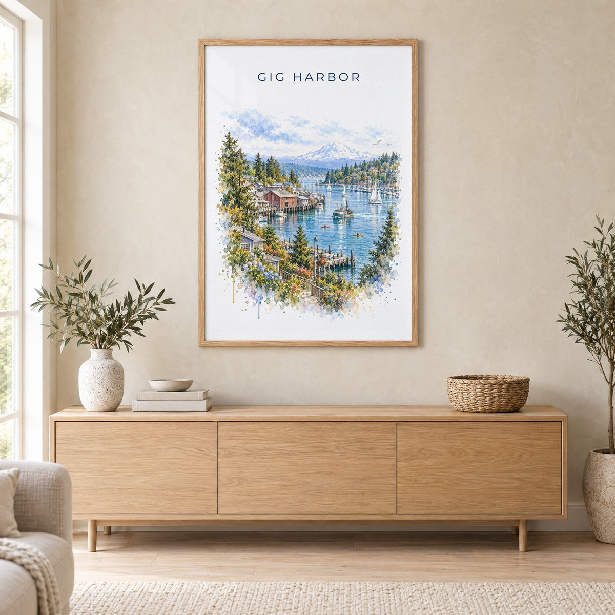 Gig Harbor, Washington watercolor print in an oak frame above a light wood sideboard in a Scandinavian living room