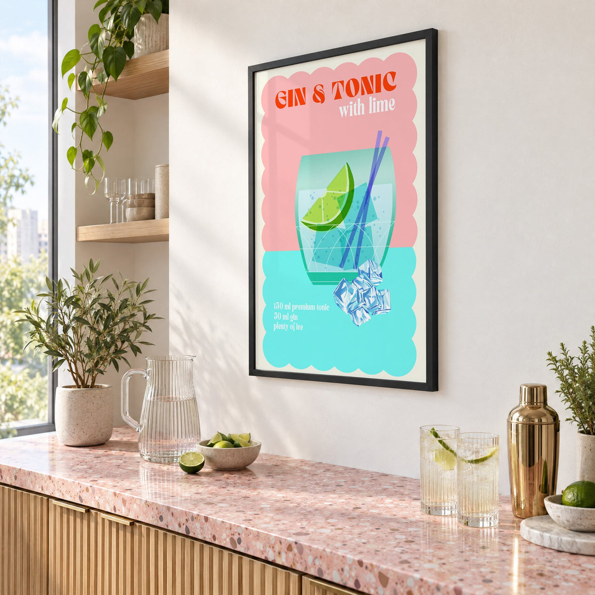 Gin & Tonic with lime aqua print in a black frame above a pink terrazzo cocktail counter with limes, seen at an angle
