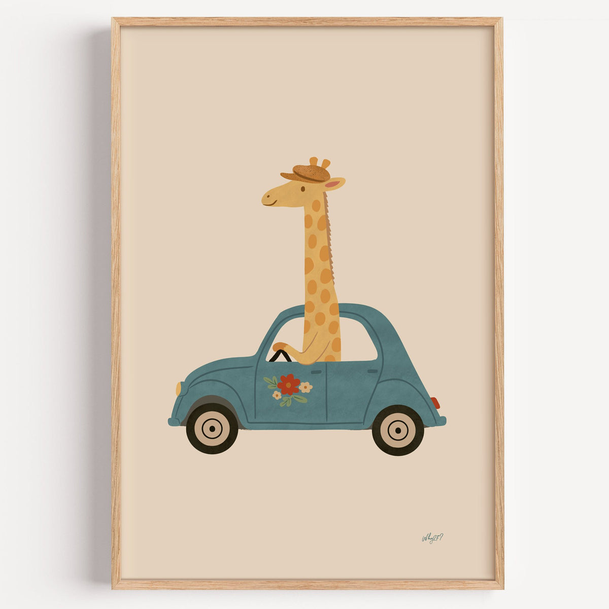 Giraffe driving a teal car nursery print in a light oak frame on a plain white wall