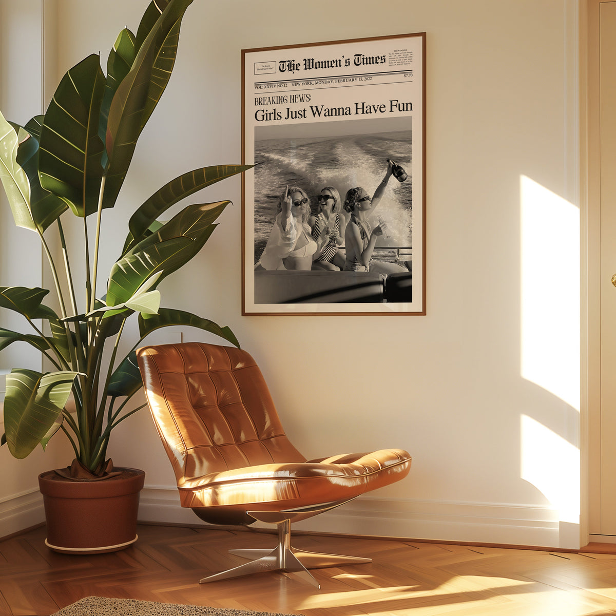 Mock front page with three women on a yacht print in a walnut frame above a leather lounge chair