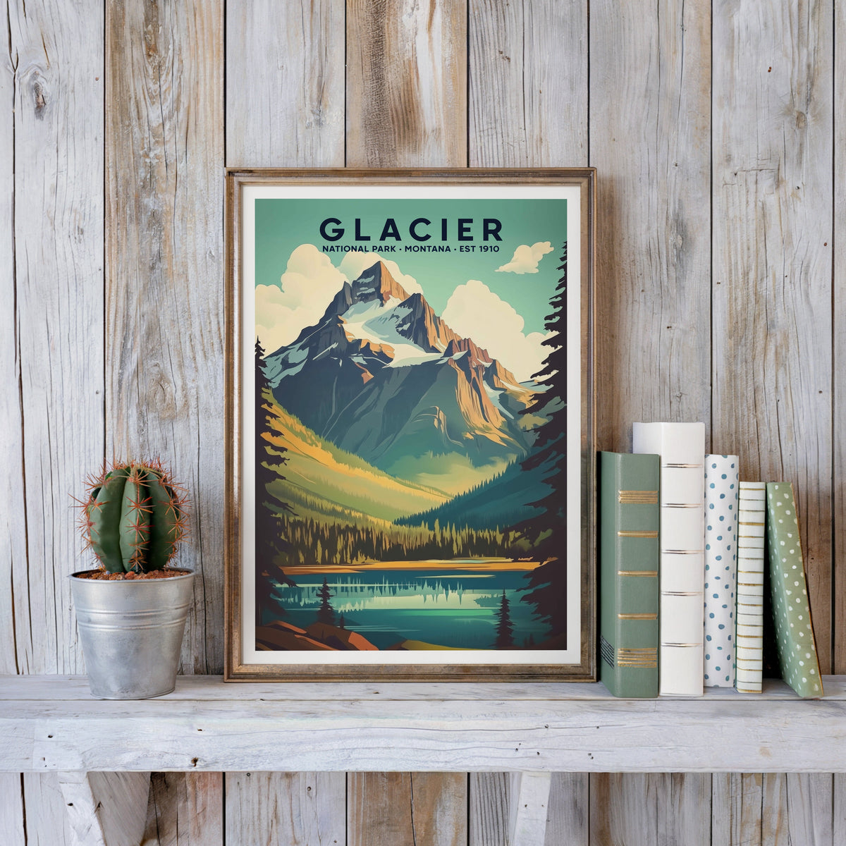 Glacier poster in an antique gold frame against whitewashed farmhouse planks beside books and a cactus