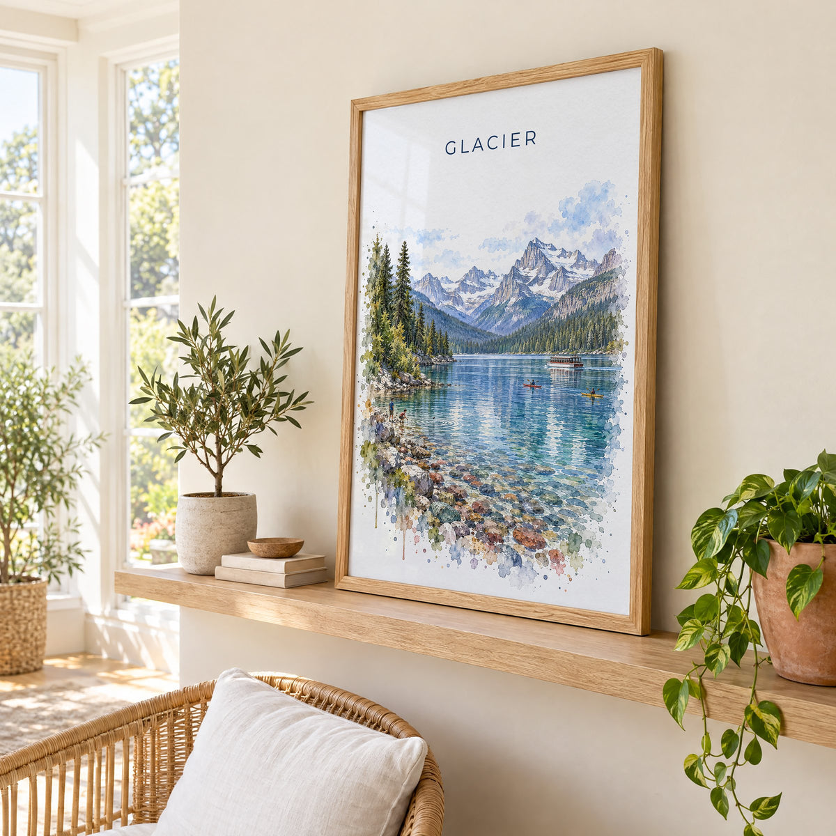 Glacier National Park watercolor print in an oak frame on a picture ledge in a sunlit sunroom
