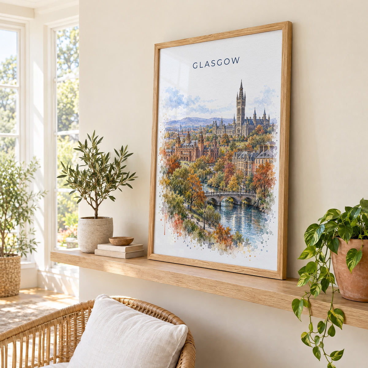 Glasgow watercolor print in an oak frame on a picture ledge in a sunlit sunroom