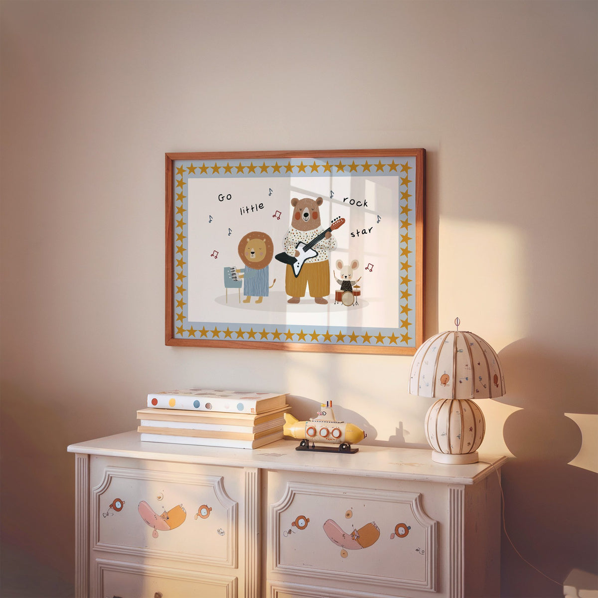 Landscape go little rock star band nursery print in a cherry wood frame above a painted dresser and lamp