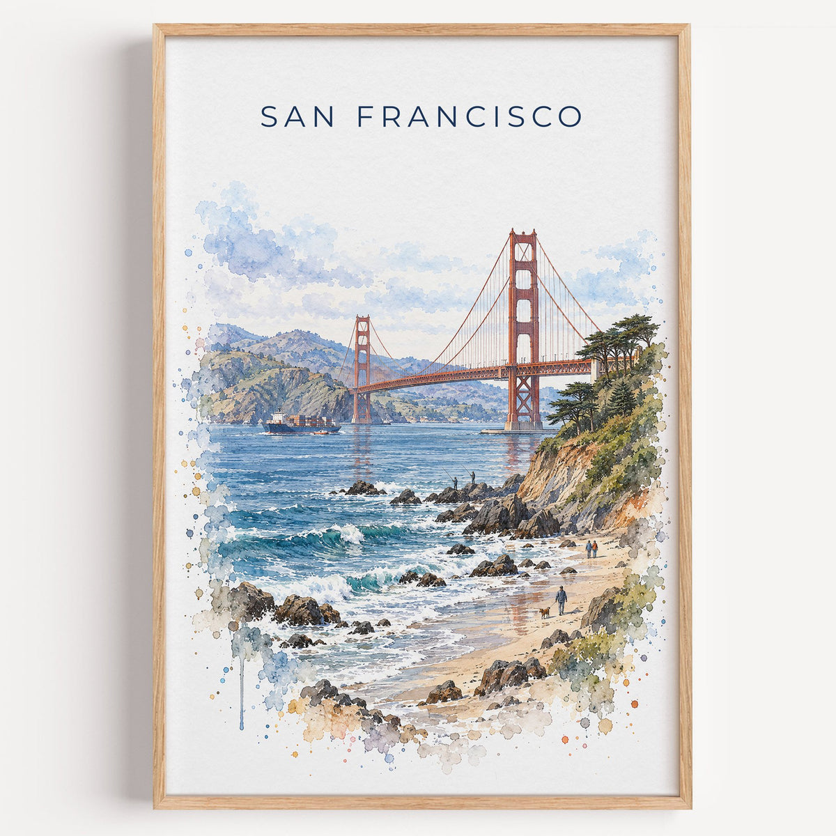 Golden Gate Bridge watercolor print in a light oak frame on a plain white wall