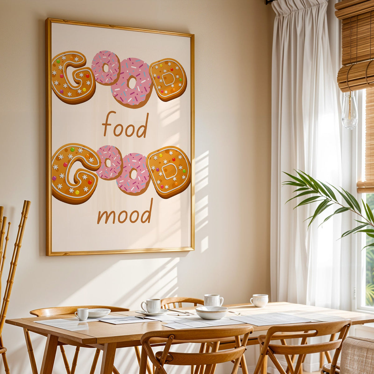Good Food Good Mood donut print shown in a gold frame above a breakfast table by a curtained window