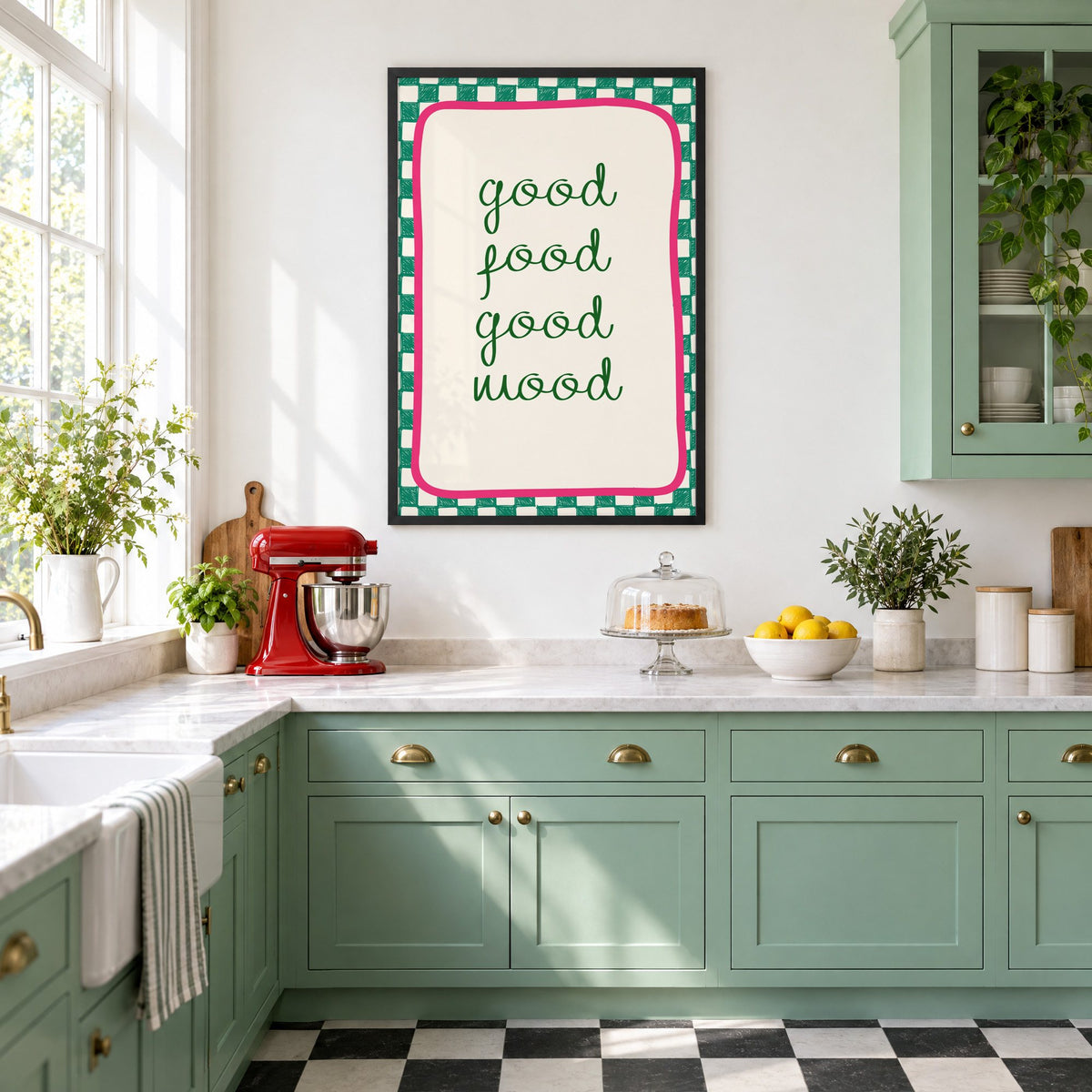 Good food good mood checkered print in a black frame in a mint green retro kitchen above a red stand mixer
