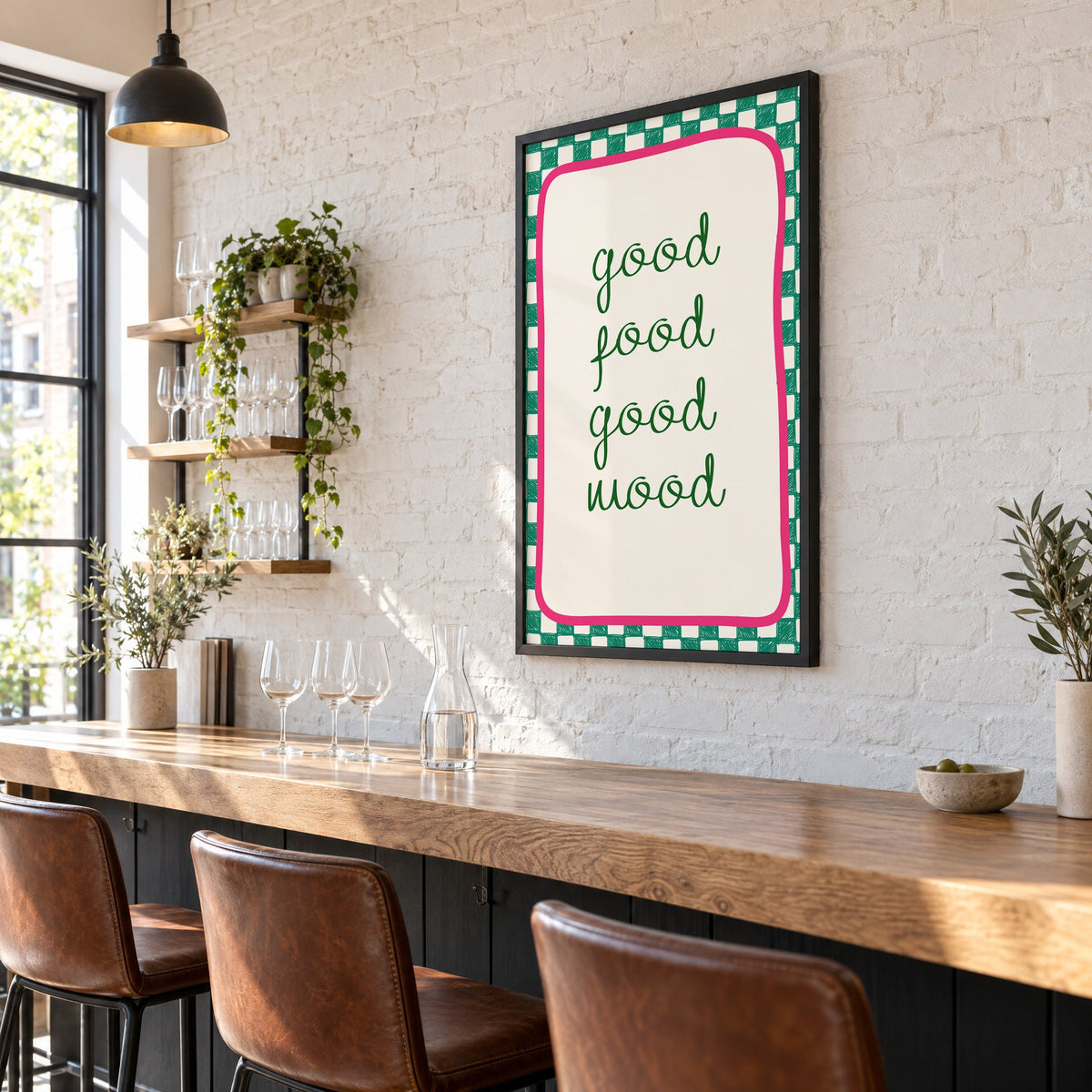 Good food good mood checkered print in a black frame on a white brick wall above a wine bar counter