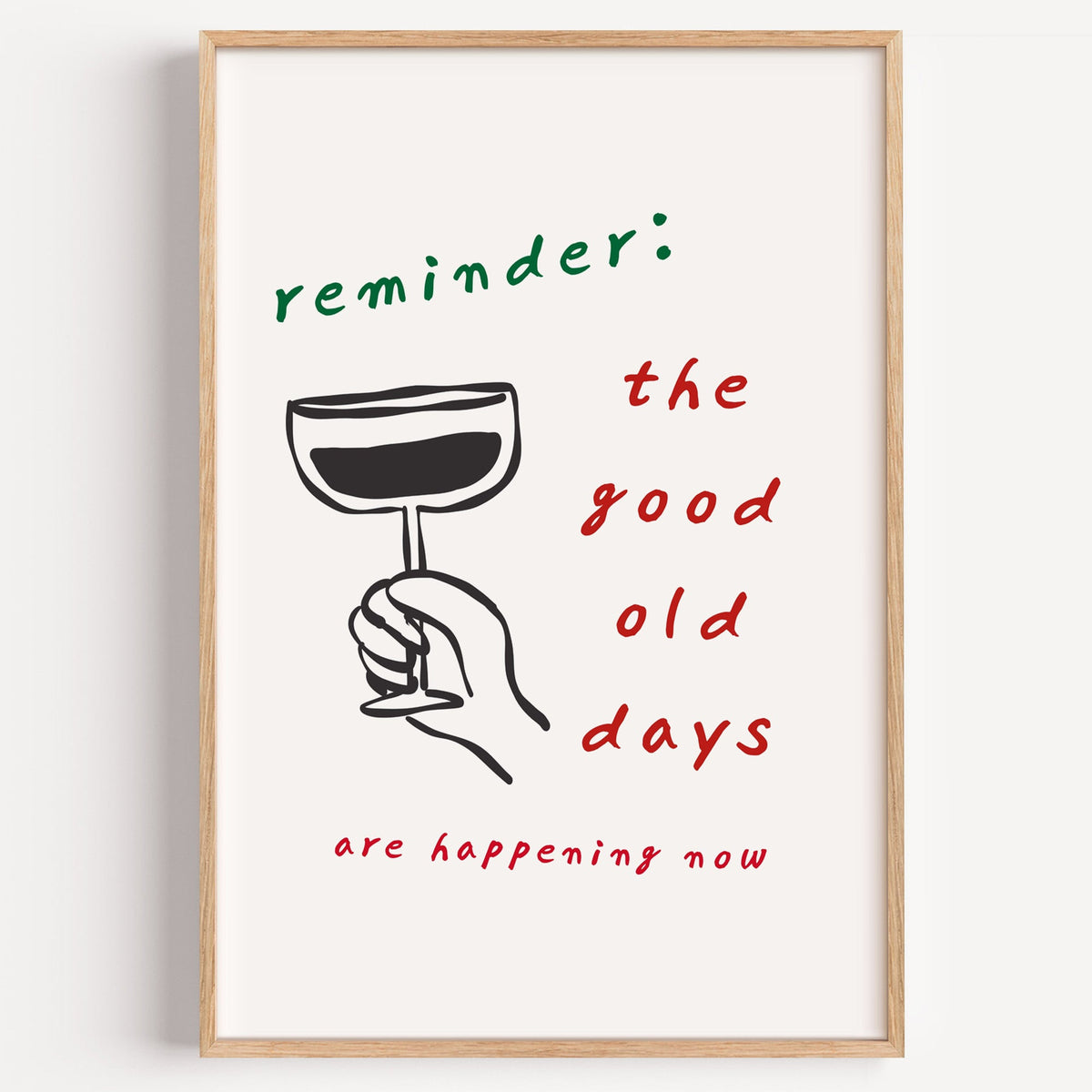 The Good Old Days coupe glass print in a light oak frame on a plain white wall