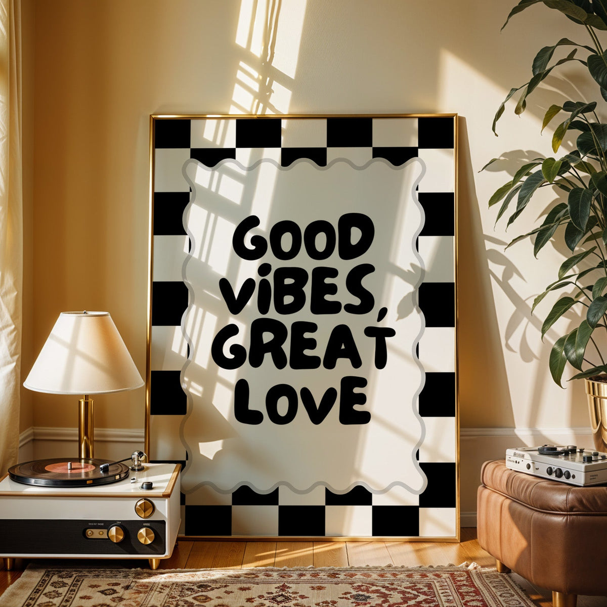 Good vibes great love checkerboard quote print shown in a gold frame beside a record player and table lamp