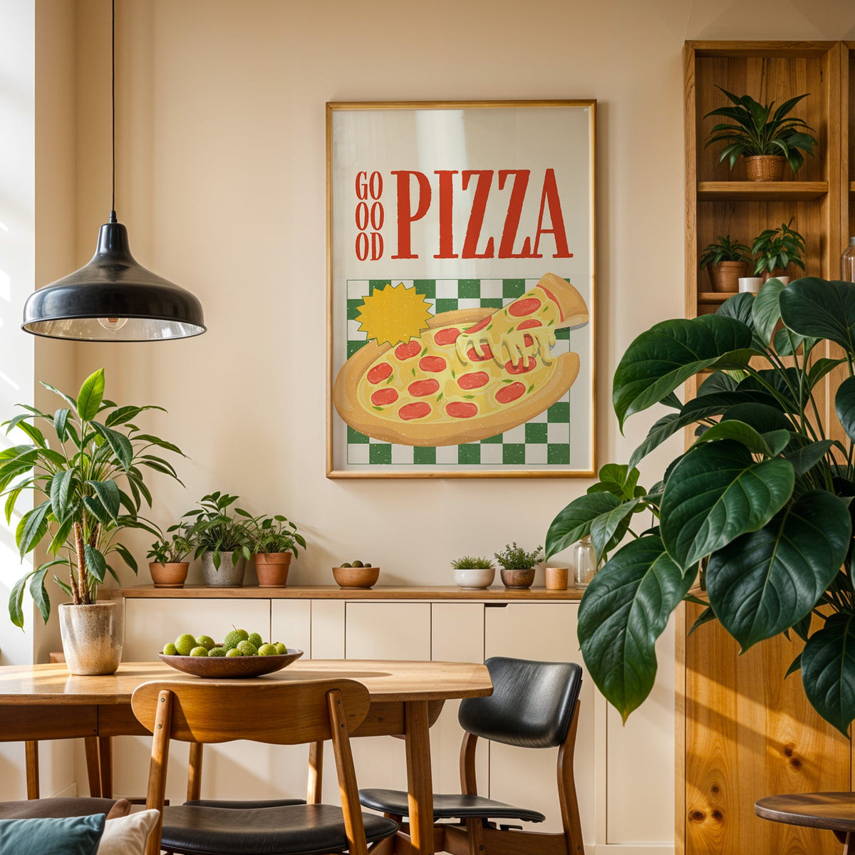 Goood Pizza print in an oak frame in a dining room above a plant-lined sideboard