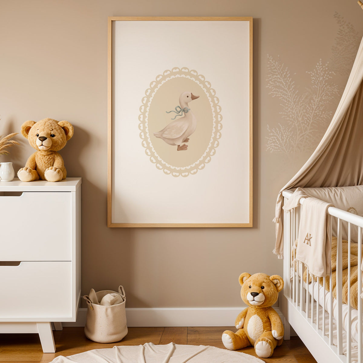 Goose with sage ribbon in heart lace oval nursery print in an oak frame between a white dresser and a canopy crib