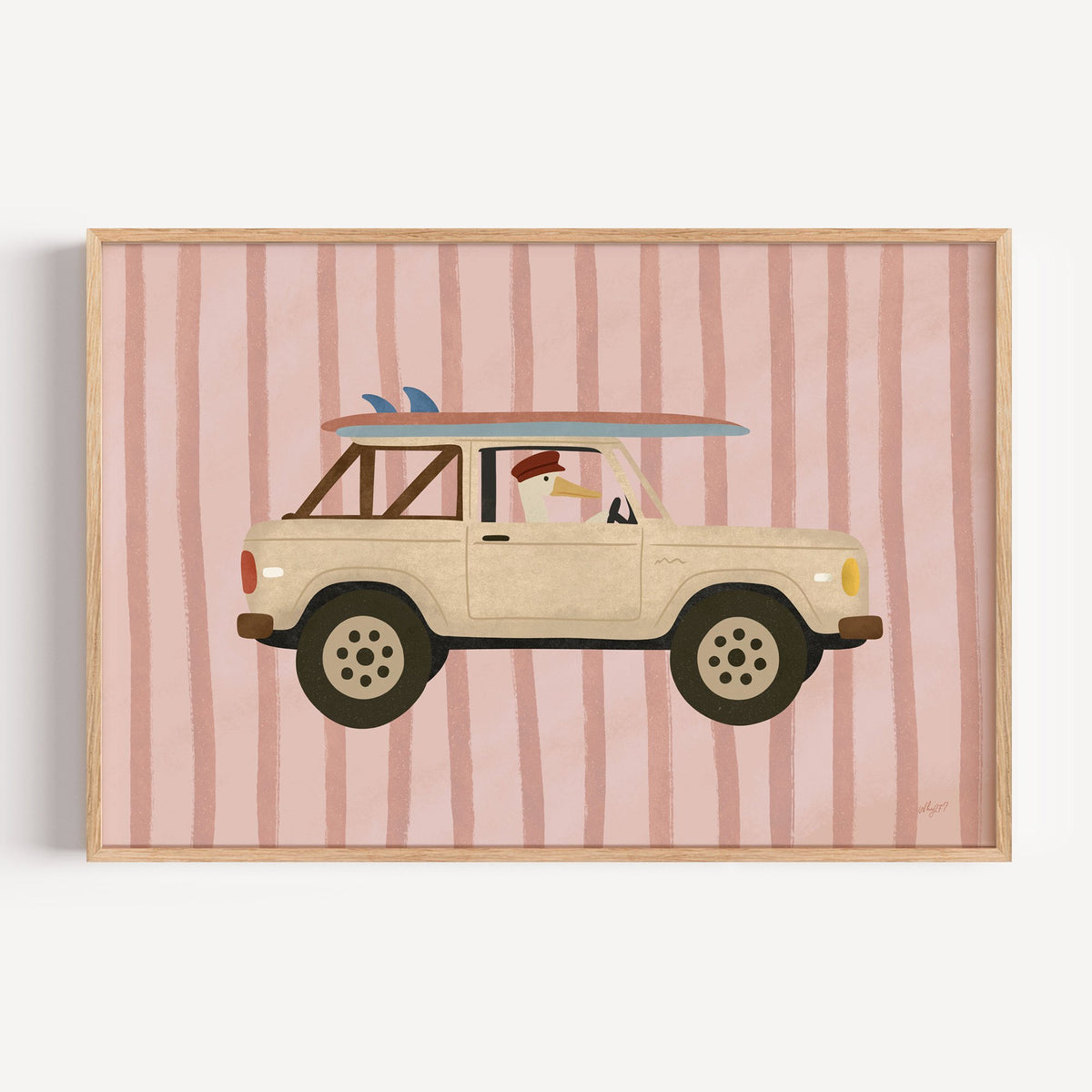 Goose driving cream surf truck nursery print in a light oak frame on a plain white wall