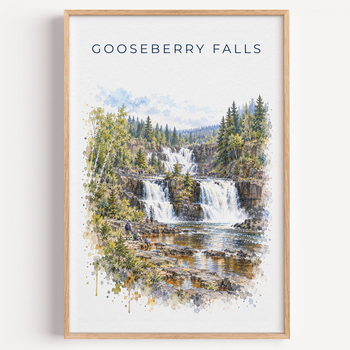 Gooseberry Falls State Park watercolor print in a light oak frame on a plain white wall