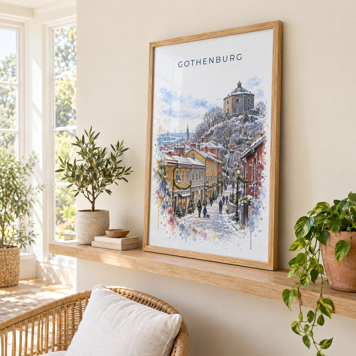 Gothenburg watercolor print in an oak frame on a picture ledge in a sunlit sunroom