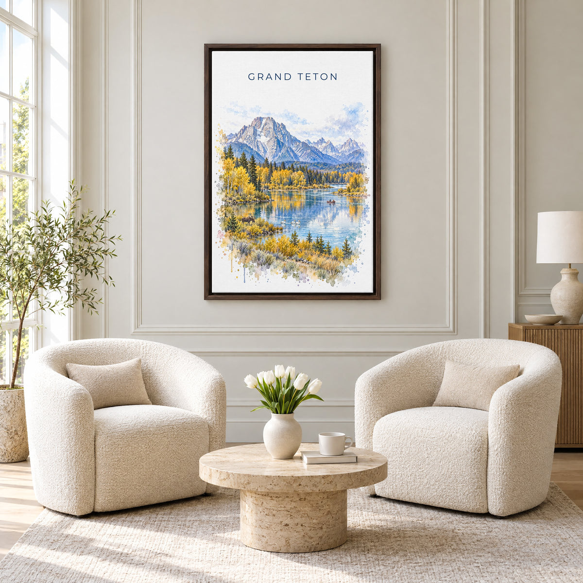 Grand Teton National Park watercolor print as an espresso floater canvas above two boucle armchairs in a hotel lounge