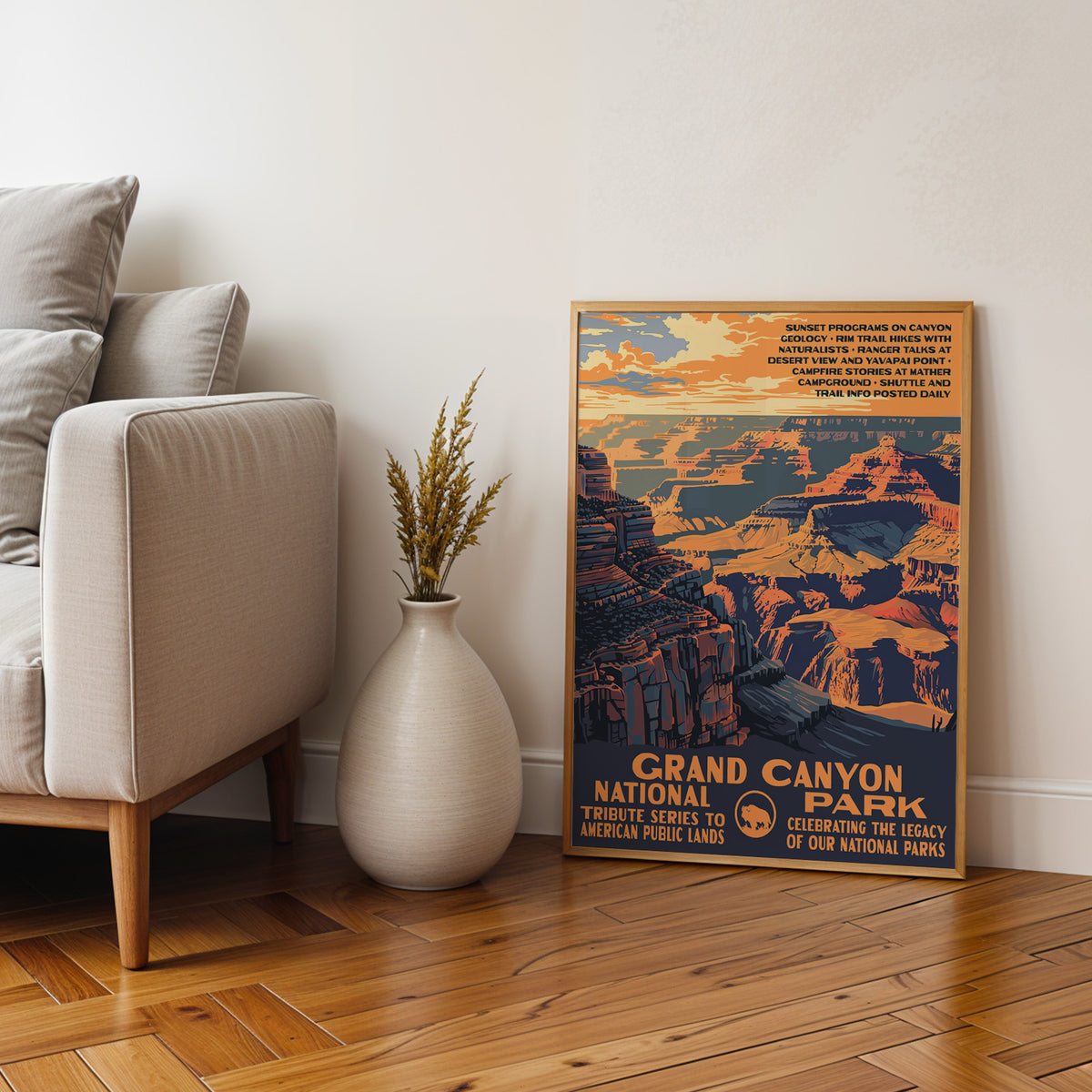 Grand Canyon National Park framed print on parquet beside an armchair and a tall stone vase