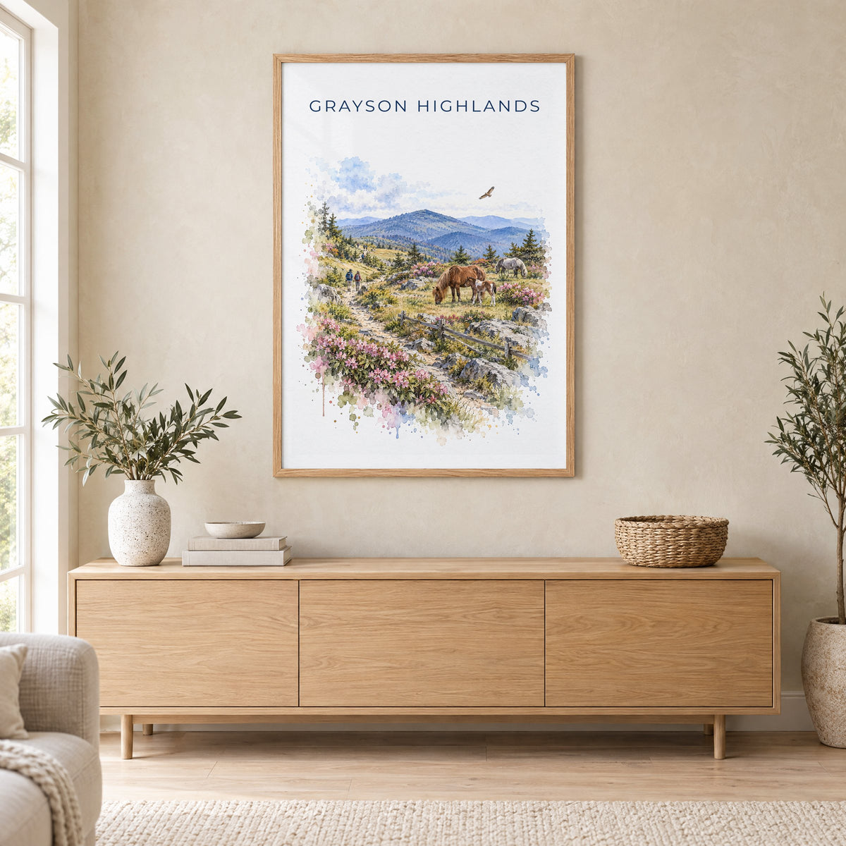 Grayson Highlands State Park watercolor print in an oak frame above a light wood sideboard in a Scandinavian living room