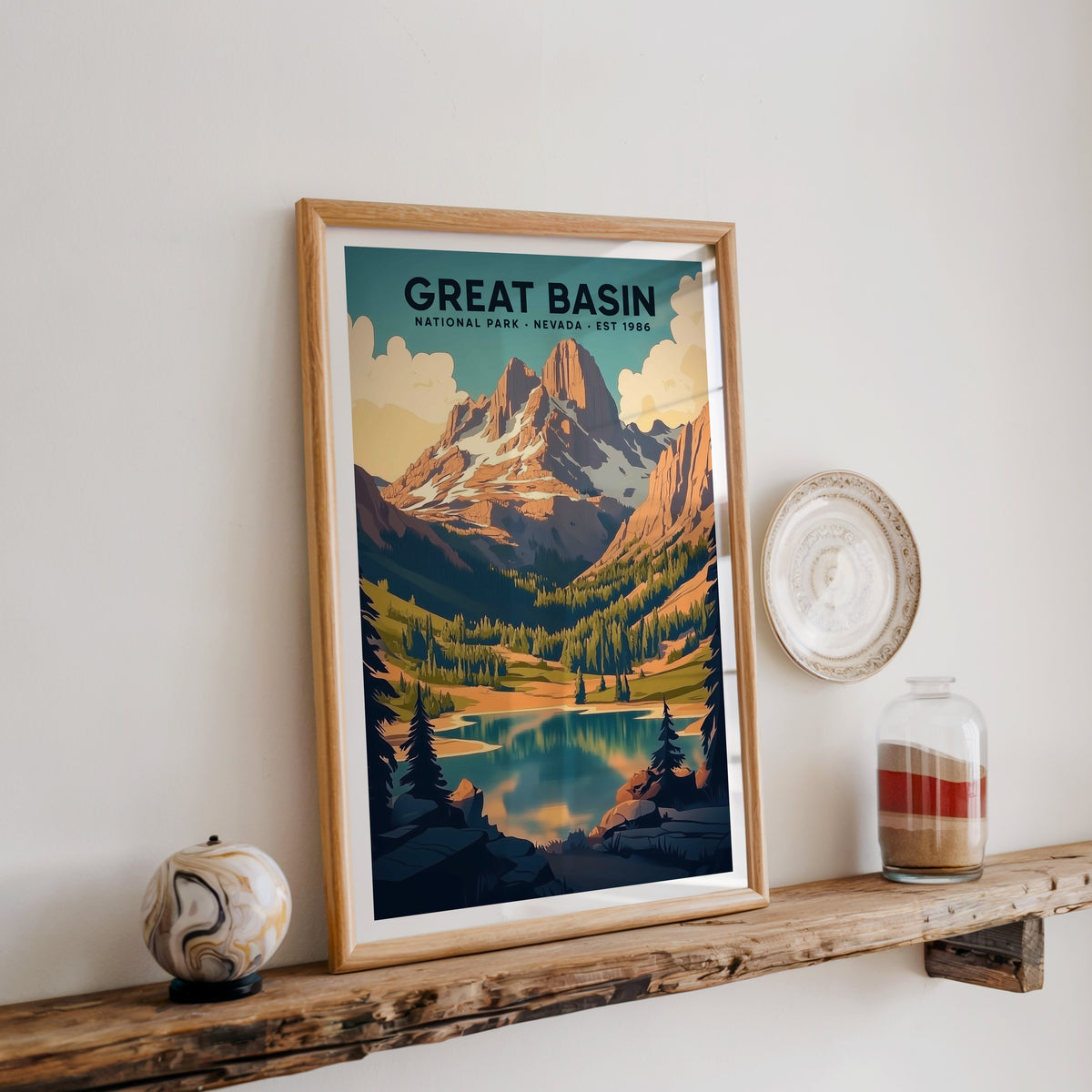 Great Basin National Park print in an oak frame on a rustic wood shelf with ceramics