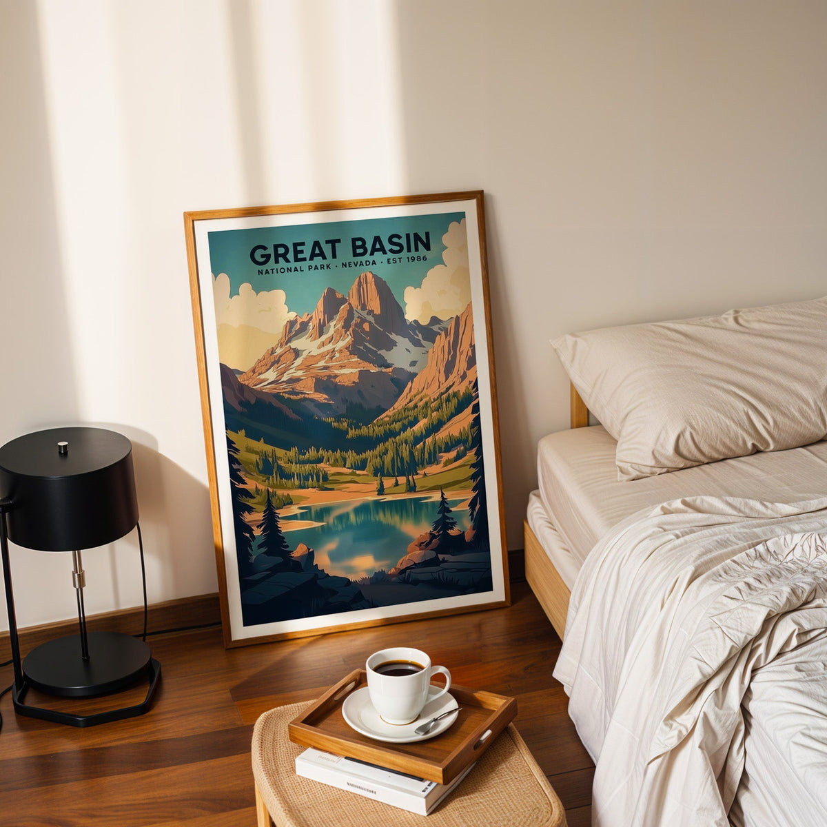 Great Basin National Park print in an oak frame leaning on a bedroom floor beside the bed