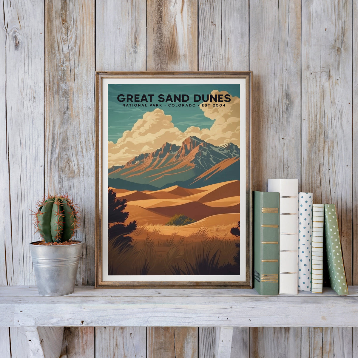 Great Sand Dunes poster in an antique gold frame against whitewashed farmhouse planks