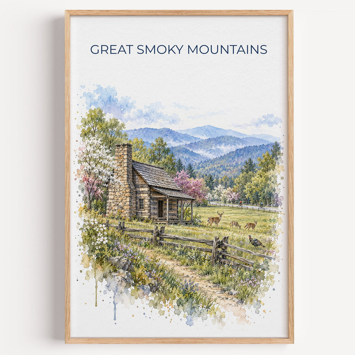 Great Smoky Mountains National Park watercolor print in a light oak frame on a plain white wall