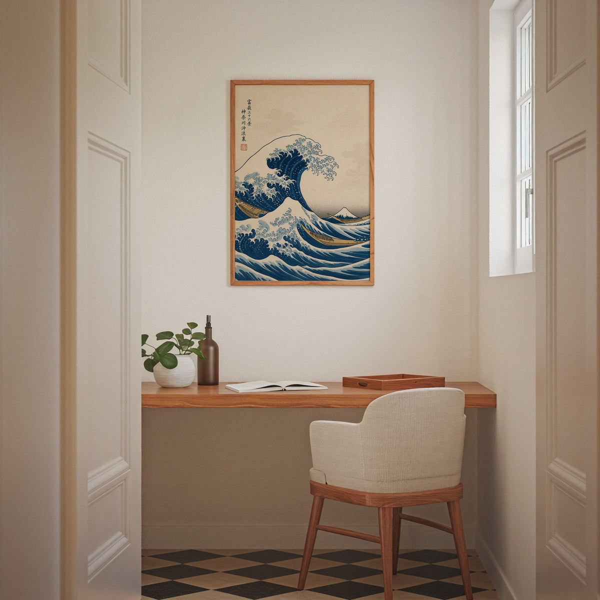 Great Wave off Kanagawa print in an oak frame above a wall-mounted desk in a home office nook