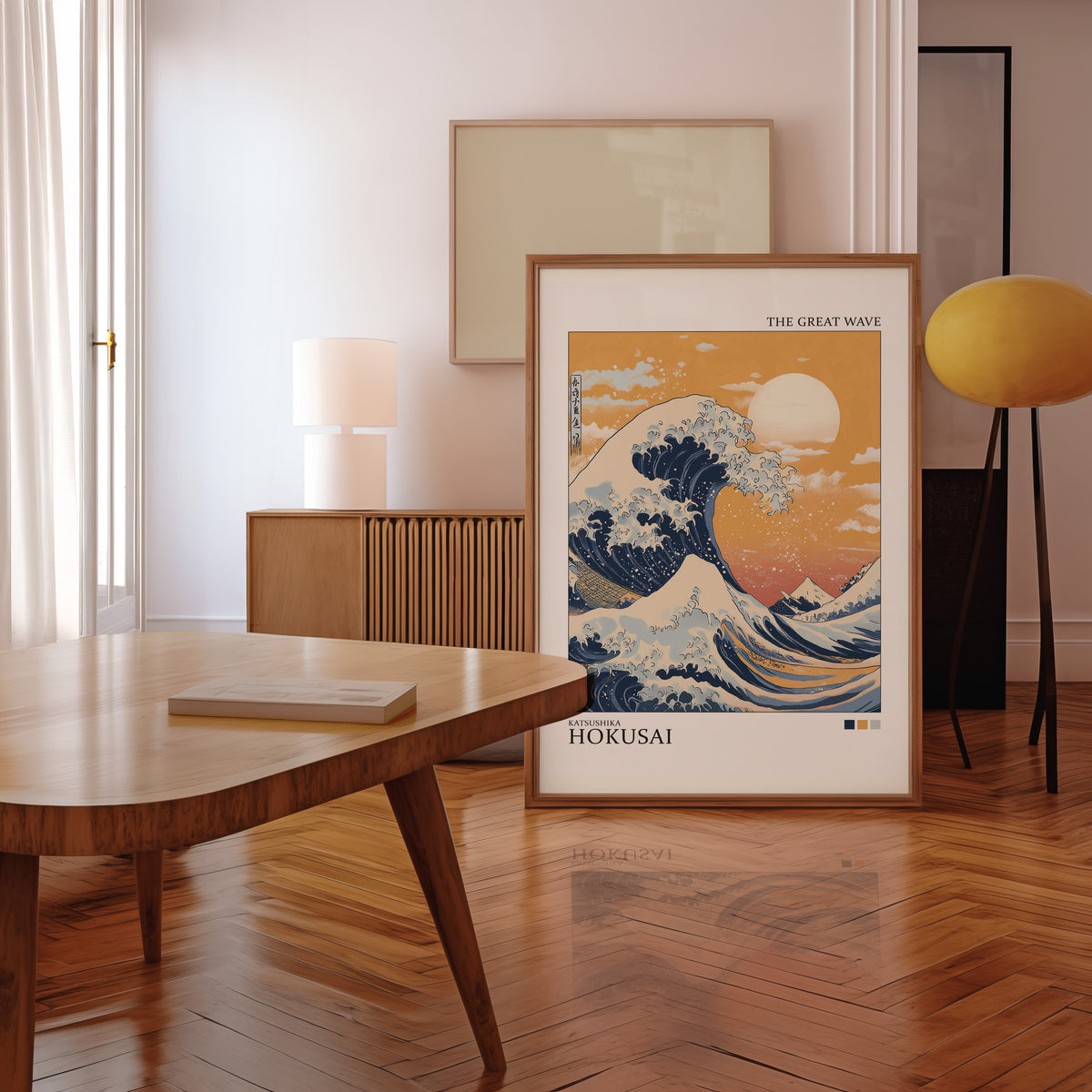 Great Wave under orange sky print in a walnut frame leaning in a mid-century living room