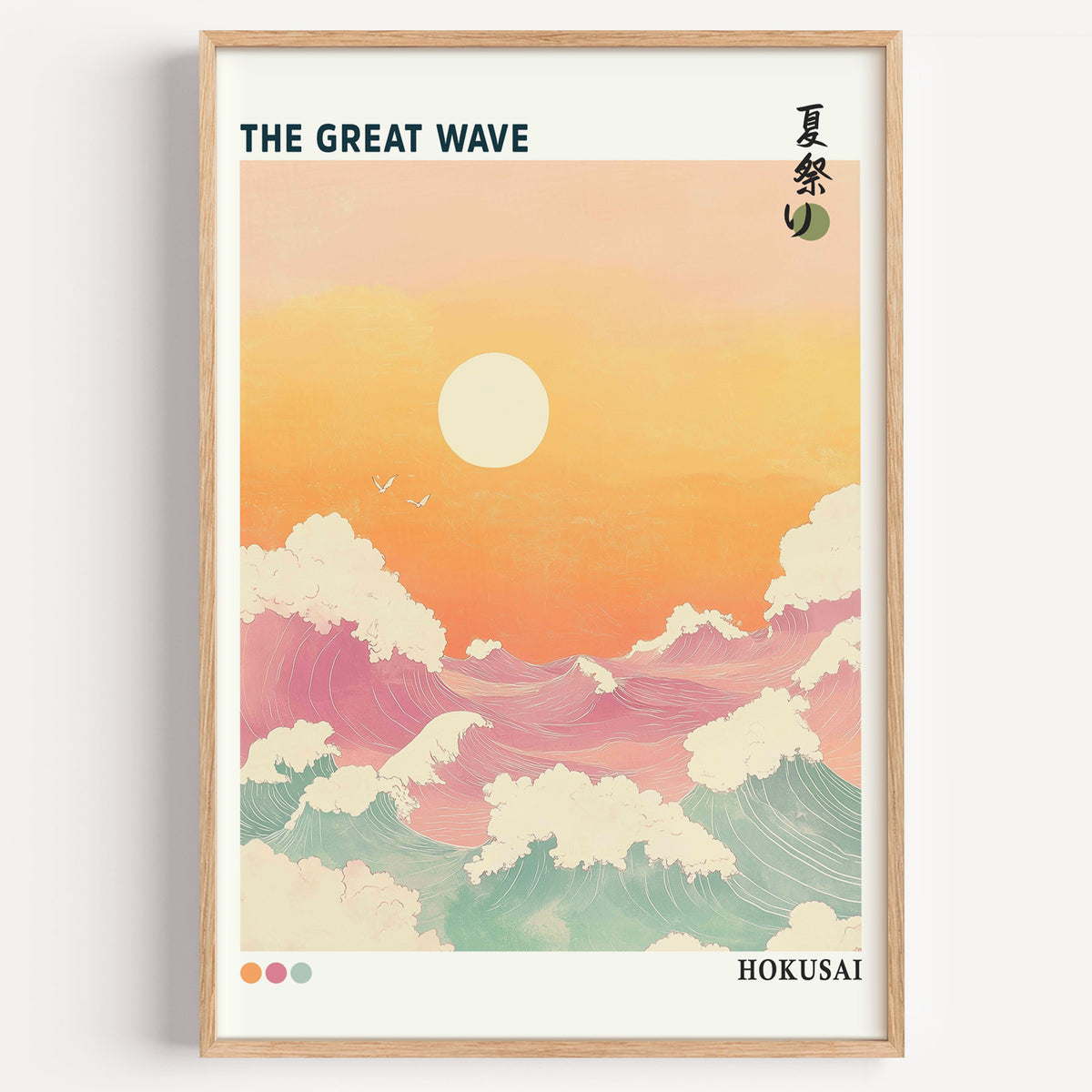 Pastel Great Wave sunset print in a light oak frame on a plain white wall