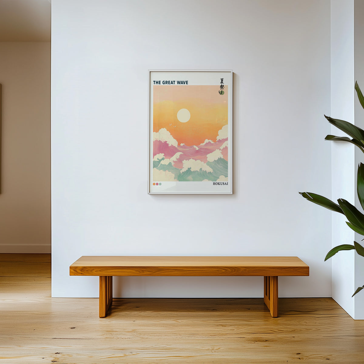 Pastel Great Wave sunset print shown in a white frame above a wooden entryway bench