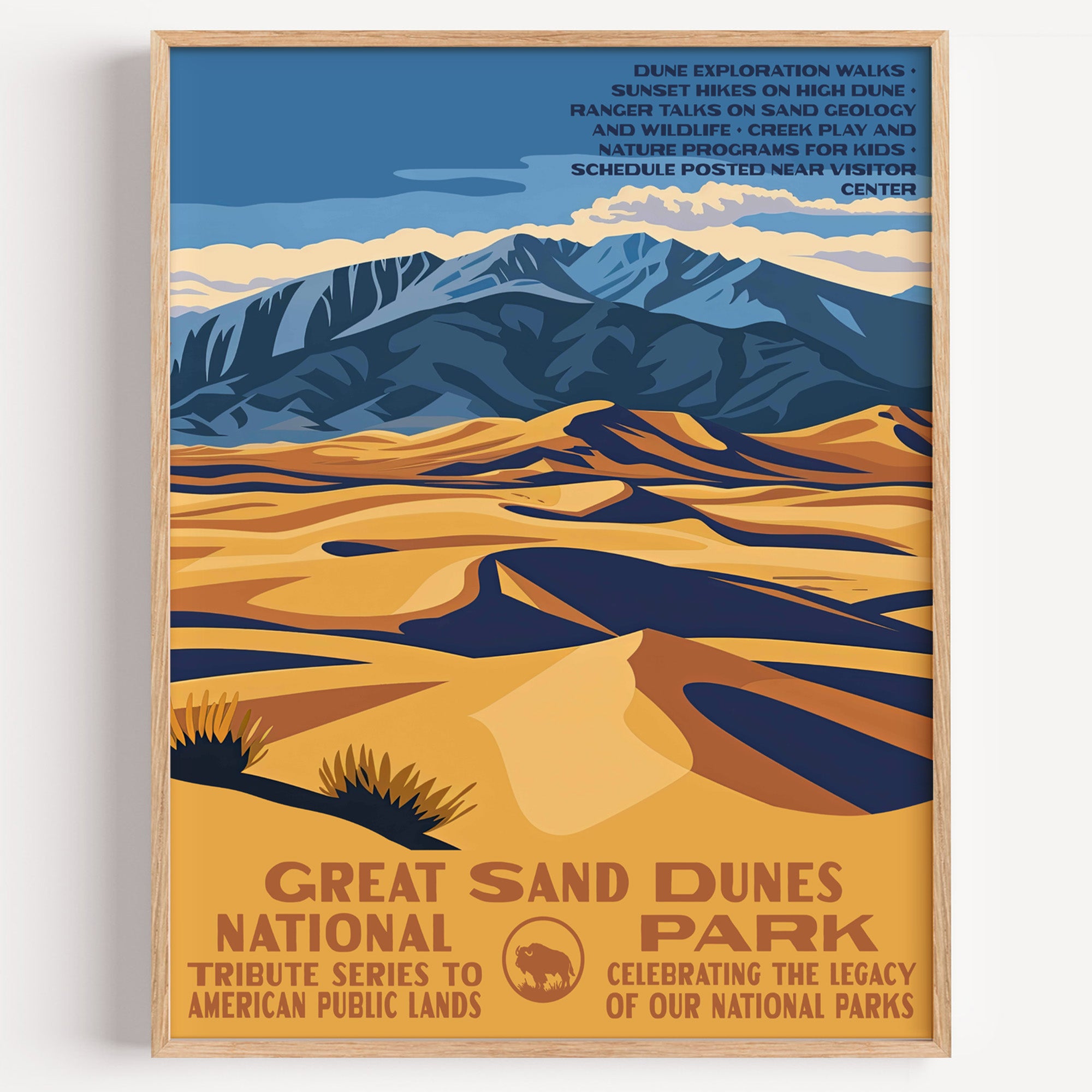 Great Sand Dunes National Park wall art print in a thin wood frame, golden dunes rolling out below the blue Sangre de Cristo