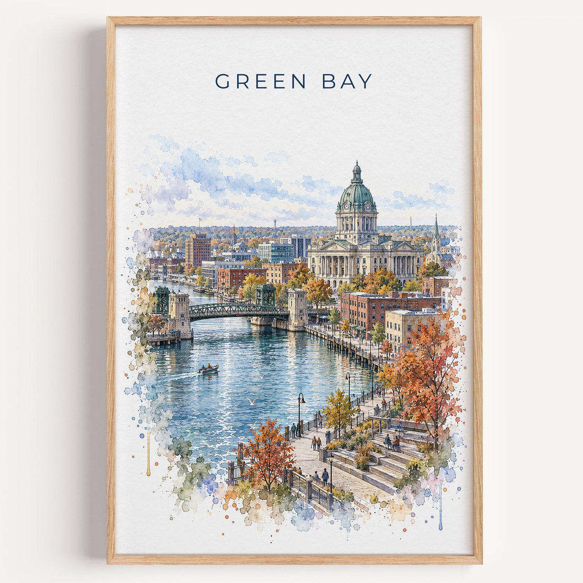 Green Bay watercolor print in a light oak frame on a plain white wall