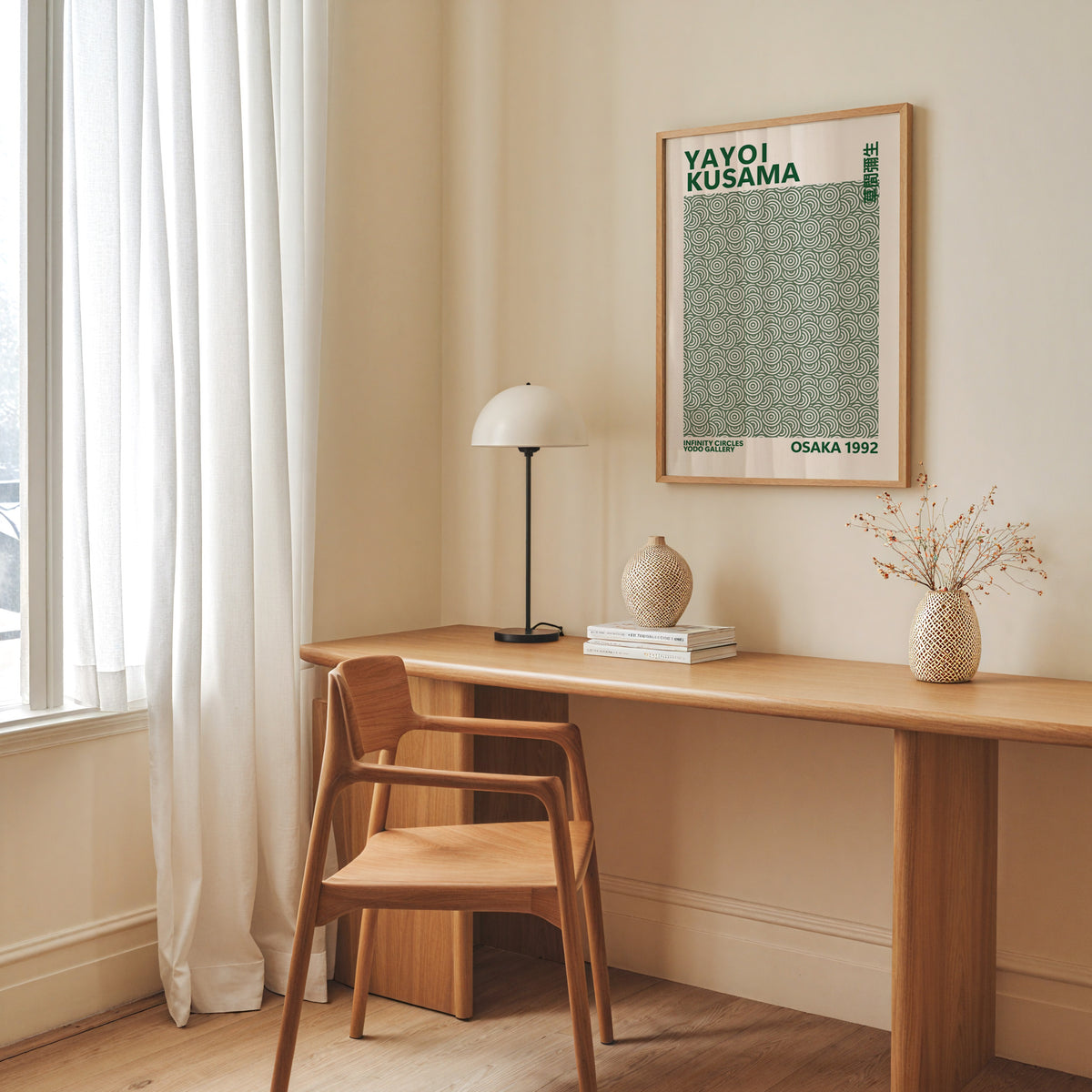 Yayoi Kusama inspired green concentric circle print above a desk with a dome lamp
