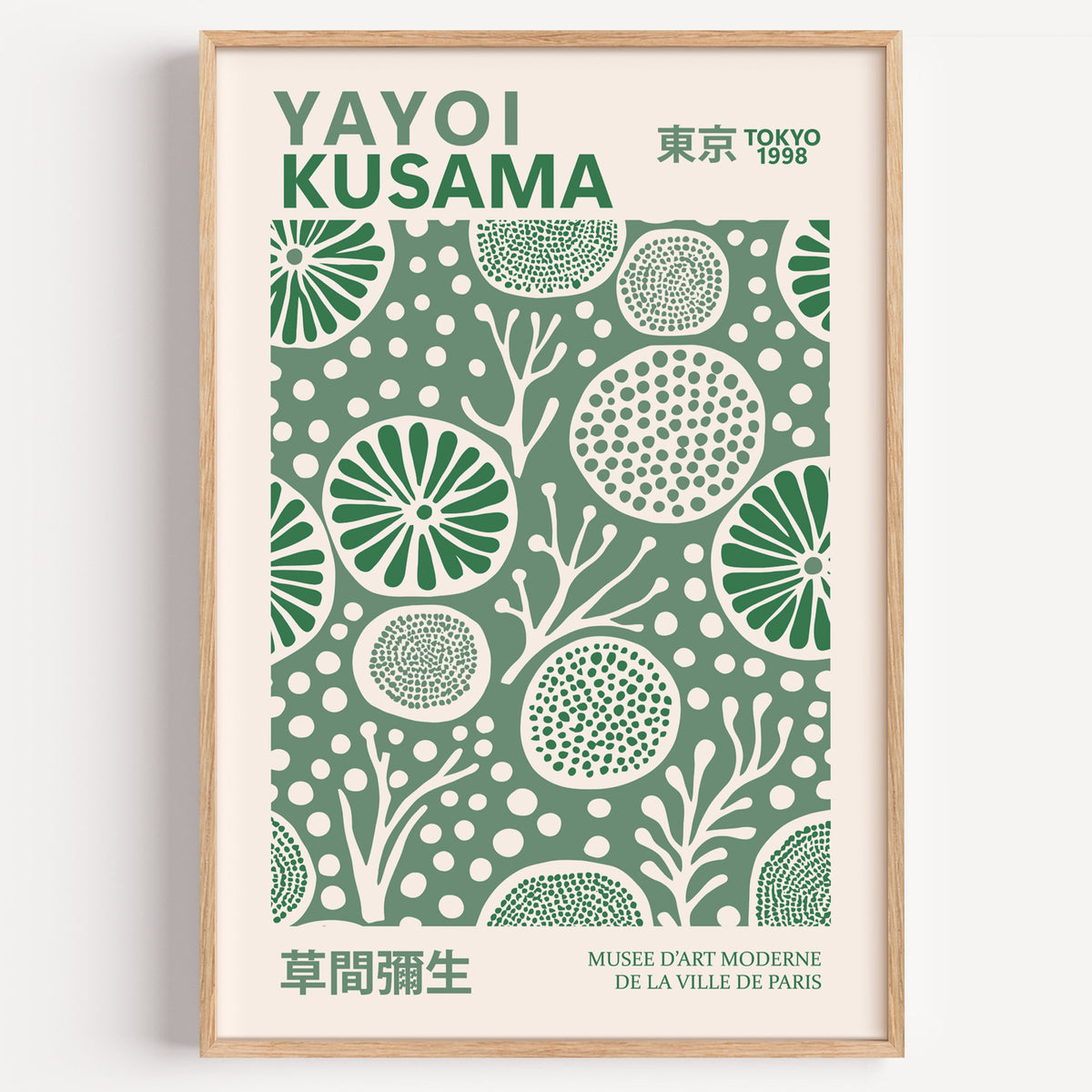 Yayoi Kusama inspired green floral dot circle print in a wood frame on a plain wall