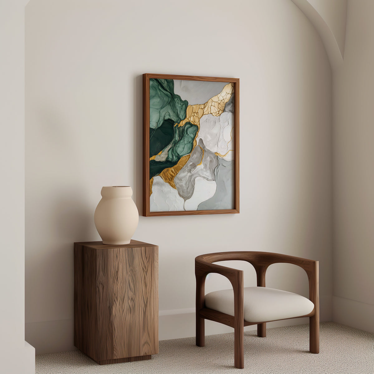 Green and gold marble texture abstract print in a walnut frame above a wood pedestal and a curved walnut armchair