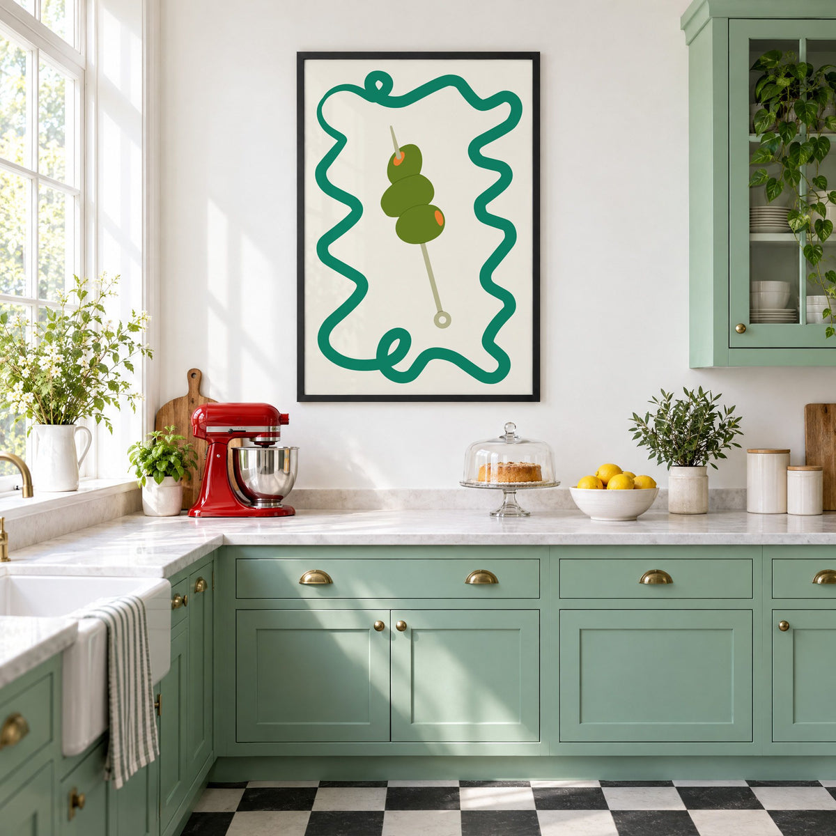 Green olives cocktail pick print in a black frame in a mint green retro kitchen above a red stand mixer