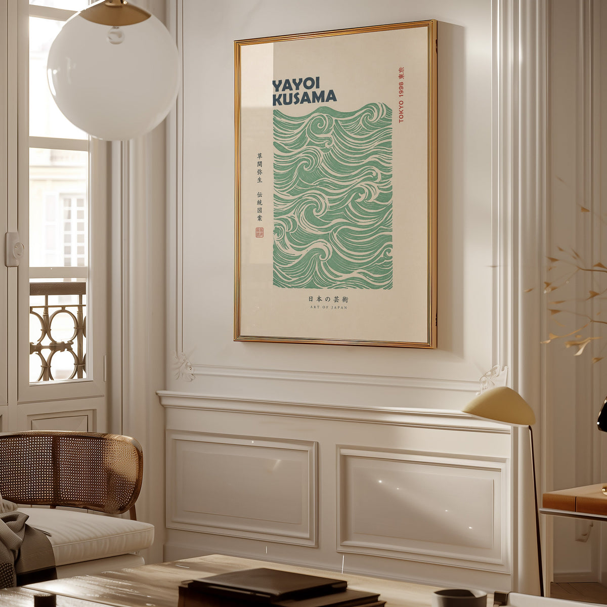 green wave pattern with bold type print shown in a gold frame on a paneled wall in a Parisian-style living room
