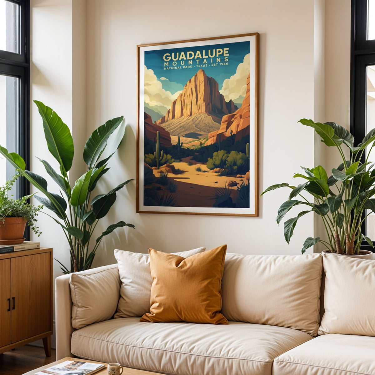 Guadalupe Mountains print in an oak frame above a cream living room sofa with a cushion