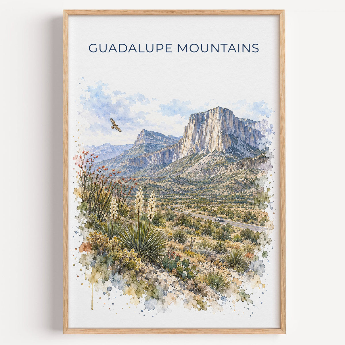 Guadalupe Mountains National Park watercolor print in a light oak frame on a plain white wall