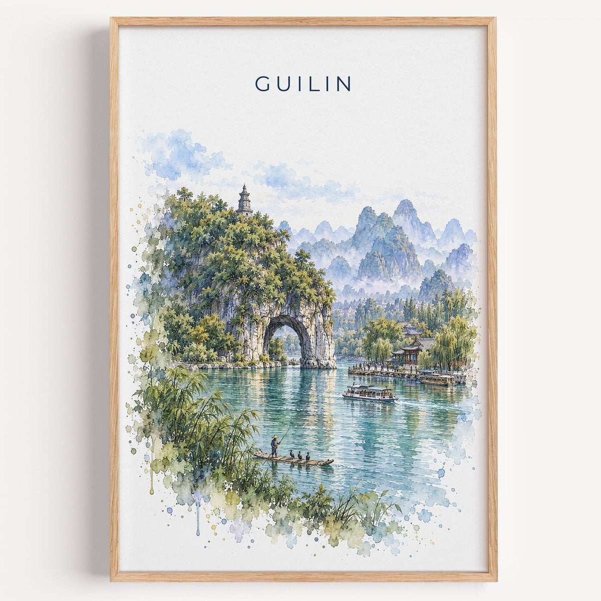 Guilin watercolor print in a light oak frame on a plain white wall