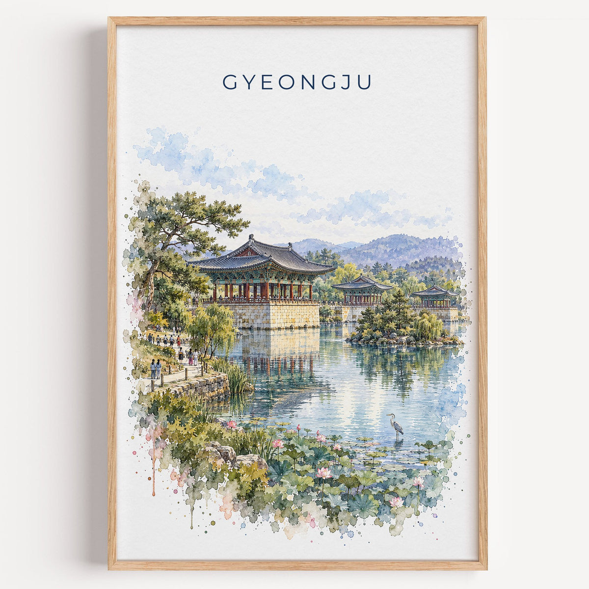 Gyeongju watercolor print in a light oak frame on a plain white wall