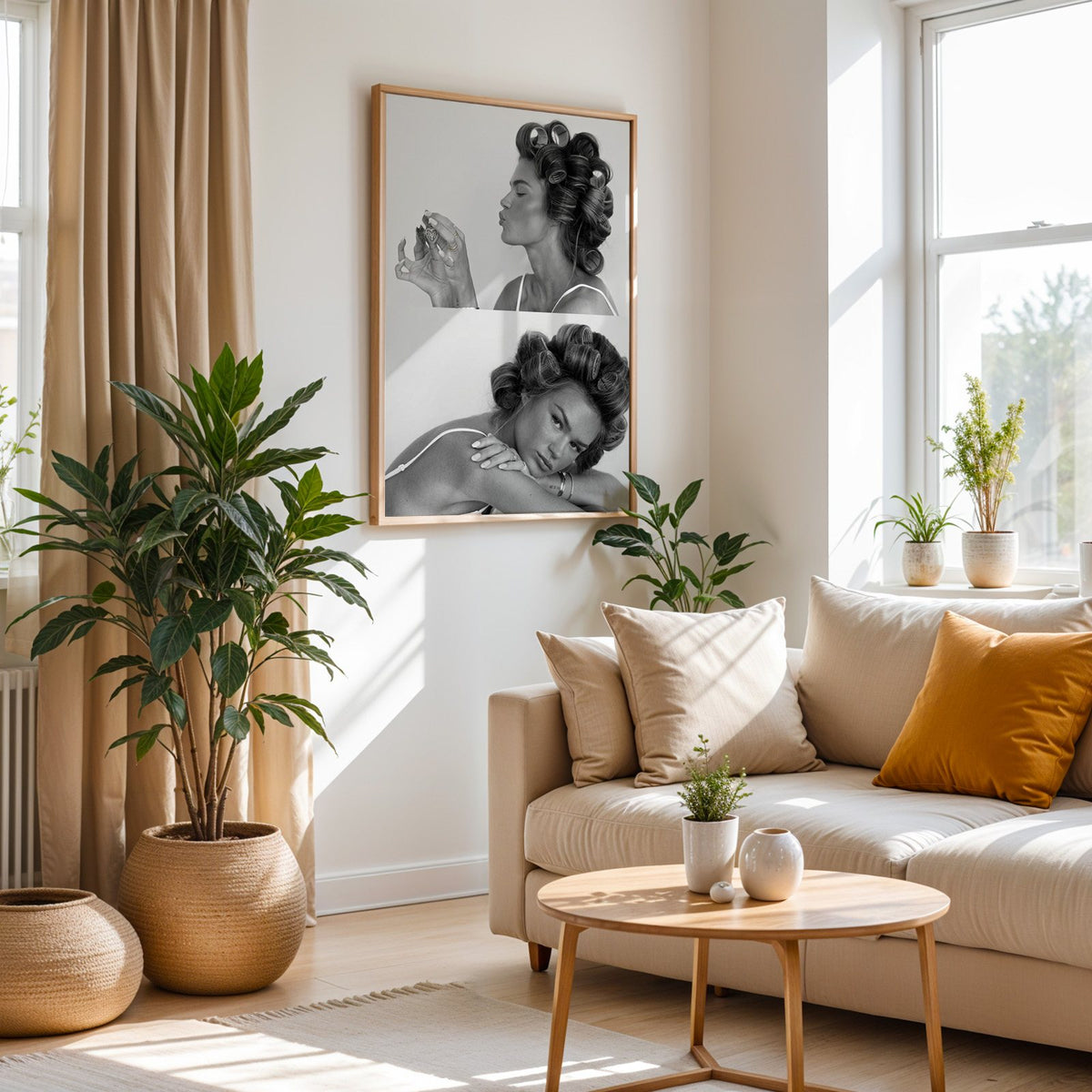 Woman in hair rollers with heart locket two frames print in an oak frame above a cream sofa beside woven planters