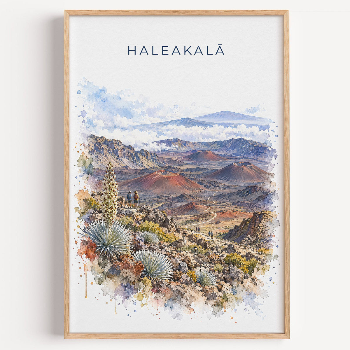 Haleakala National Park watercolor print in a light oak frame on a plain white wall