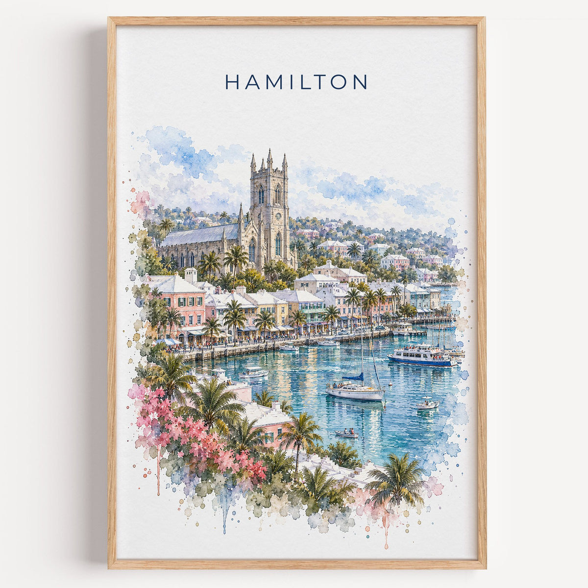 Hamilton, Bermuda watercolor print in a light oak frame on a plain white wall