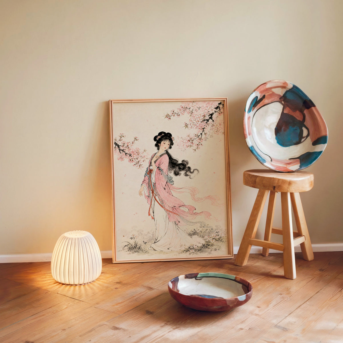woman in pink hanfu under blossom print in a light wood frame leaning on a wooden floor by a glowing lamp and stool