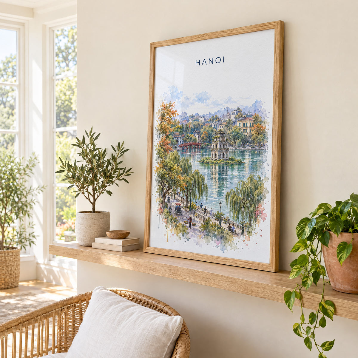 Hanoi watercolor print in an oak frame on a picture ledge in a sunlit sunroom