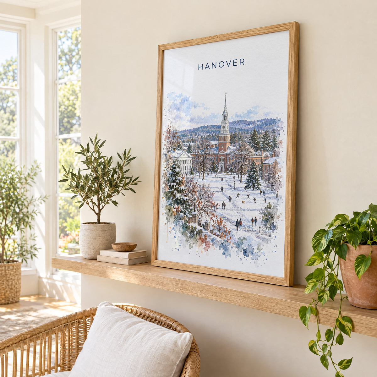 Hanover, New Hampshire watercolor print in an oak frame on a picture ledge in a sunlit sunroom