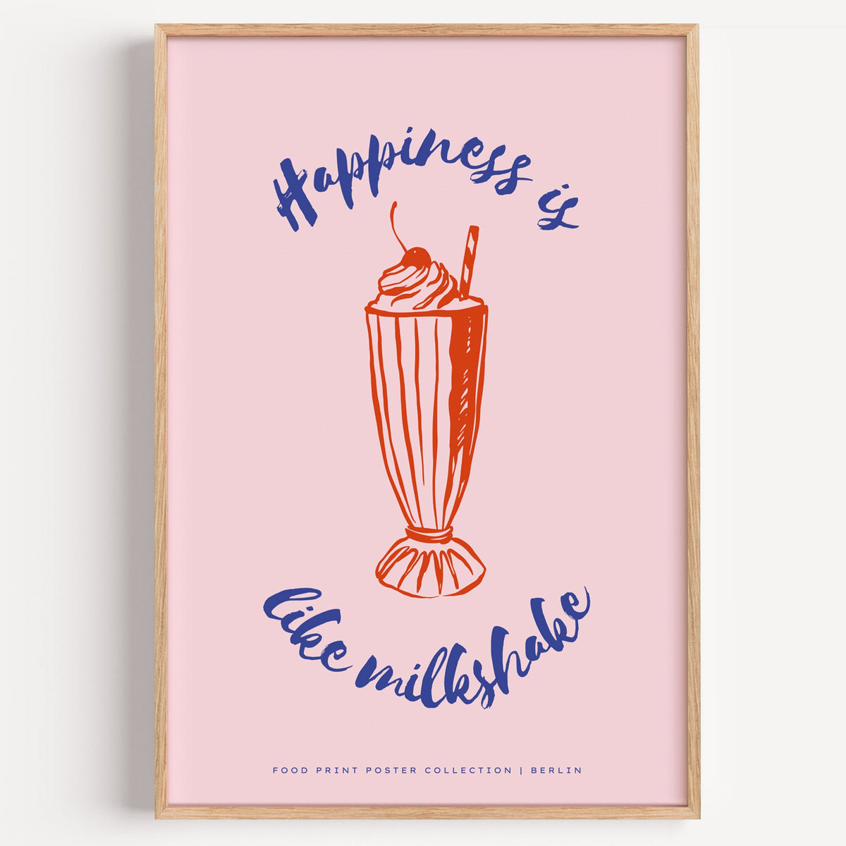 Happiness Is Like Milkshake poster in red on blush pink, on a plain white background